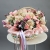 Композиция в корзине "Диодора" из французских роз Квиксенд, диантусов и кустовых пионовидных роз Бомбастик в Бронницах